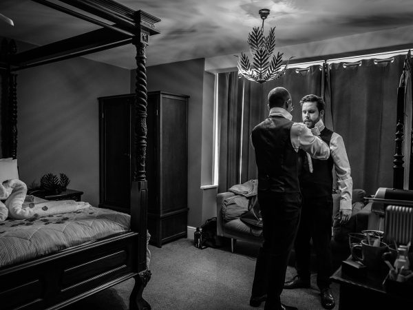 Adam and Abbey’s wedding at Tottington Manor – groom getting ready in the bedroom
