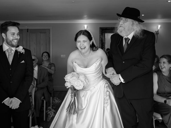 Adam and Abbey’s wedding at Tottington Manor – bride and her father reaching the groom