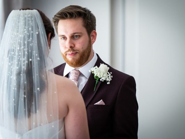 Adam and Abbey’s wedding at Tottington Manor – groom seeing his bride at the ceremony