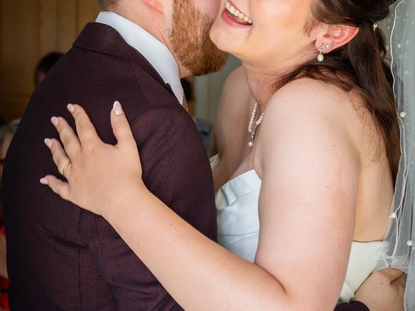 Adam and Abbey’s wedding at Tottington Manor – newlyweds hugging after the ceremony