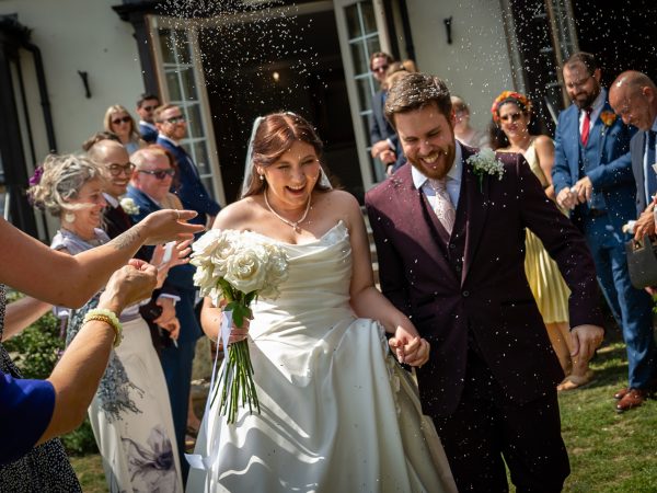 Adam and Abbey’s wedding at Tottington Manor – confetti on the lawn