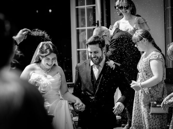 Adam and Abbey’s wedding at Tottington Manor – confetti in black and white