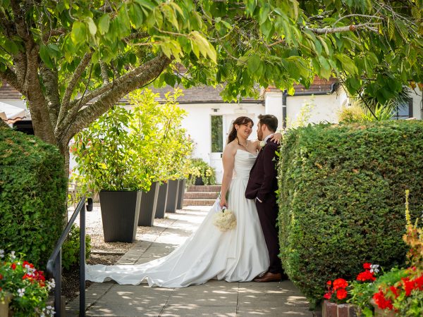 Adam and Abbey’s wedding at Tottington Manor – couple in the garden