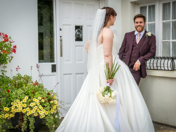 Adam and Abbey’s wedding at Tottington Manor – couple outside the manor