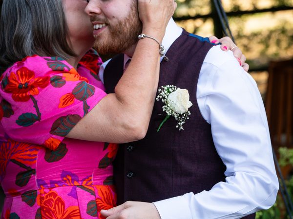 Adam and Abbey’s wedding at Tottington Manor – groom greeting a guest