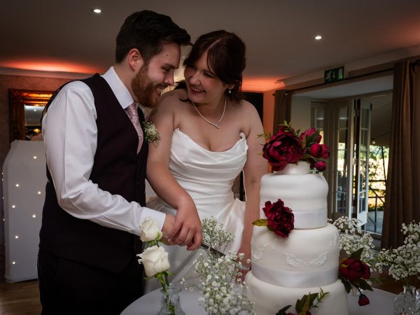 Adam and Abbey’s wedding at Tottington Manor – cutting the wedding cake