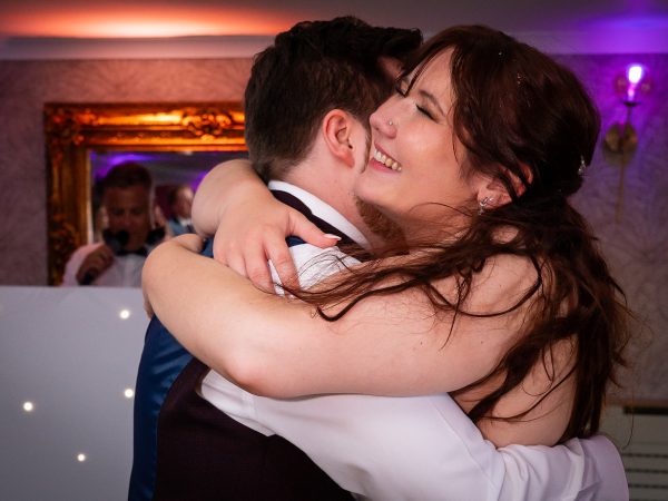 Adam and Abbey’s wedding at Tottington Manor – a big hug on the dance floor