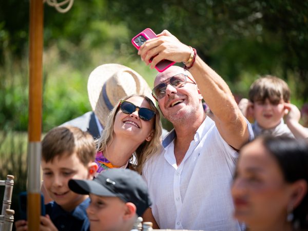 Holly and Andy’s wedding at Field Place – guests taking a selfie in the garden