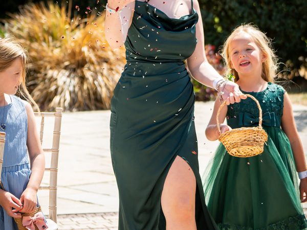 Holly and Andy’s wedding at Field Place – bridesmaid and flower girl walking down the aisle