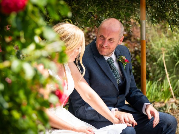 Holly and Andy’s wedding at Field Place – bride and groom during the ceremony