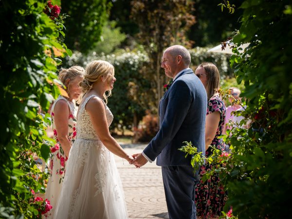 Holly and Andy’s wedding at Field Place – bride and groom exchanging vows