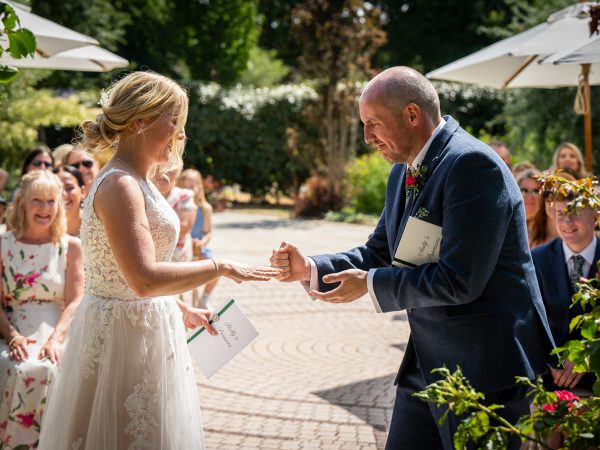 Holly and Andy’s wedding at Field Place – exchanging rings