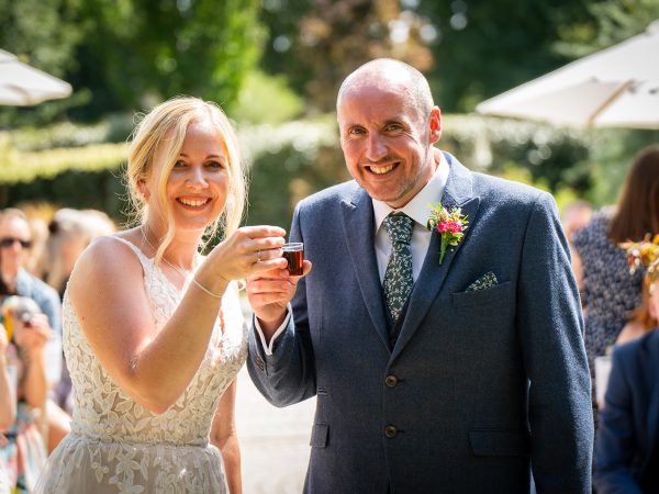 Holly and Andy’s wedding at Field Place – a shared laugh during the ceremony