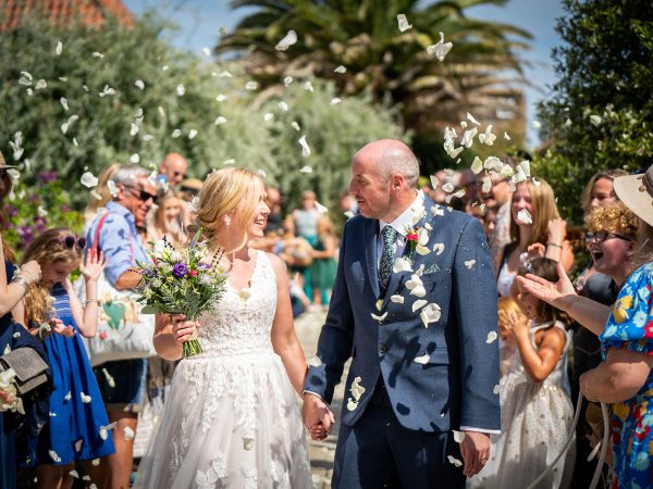 Holly and Andy’s wedding at Field Place – confetti shower in the garden