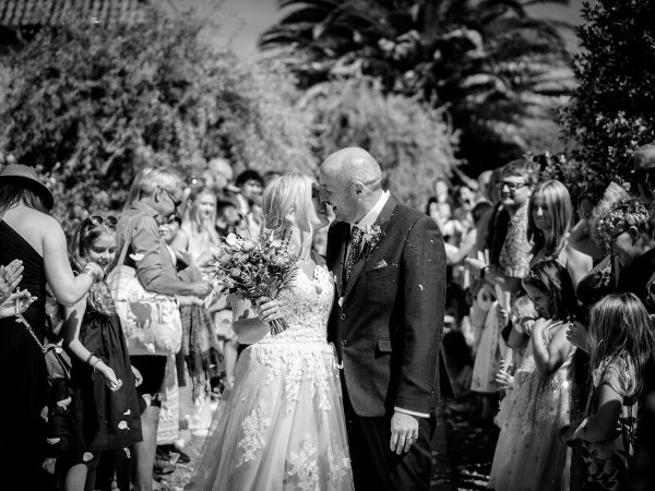 Holly and Andy’s wedding at Field Place – confetti in black and white