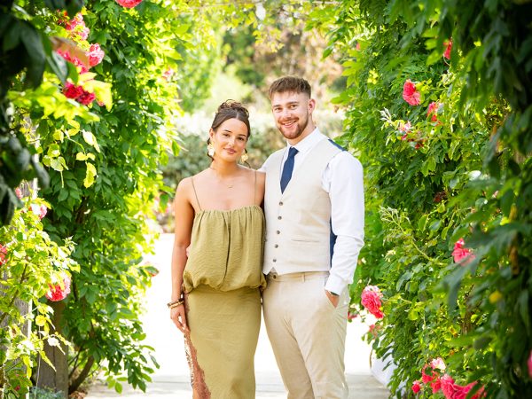 Holly and Andy’s wedding at Field Place – guests in the rose garden