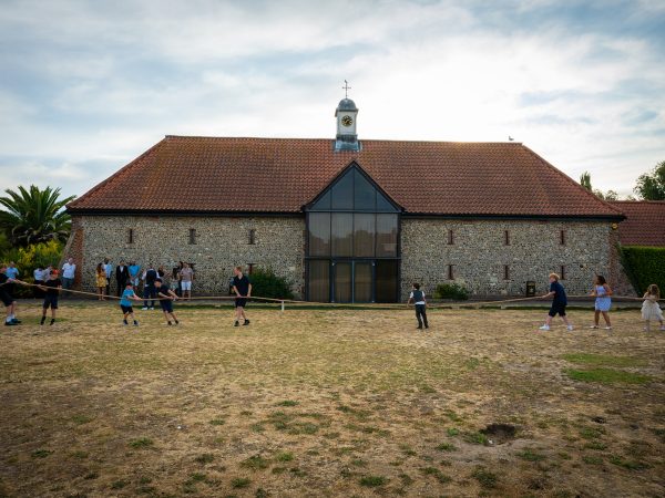Holly and Andy’s wedding at Field Place – lawn games outside the barn