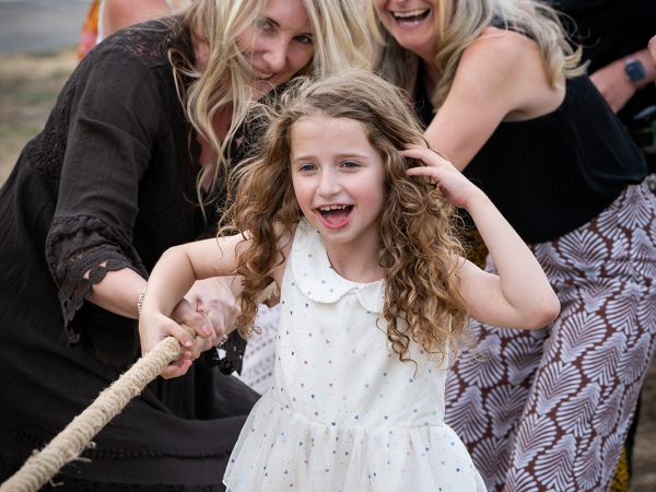 Holly and Andy’s wedding at Field Place – tug of war with the guests