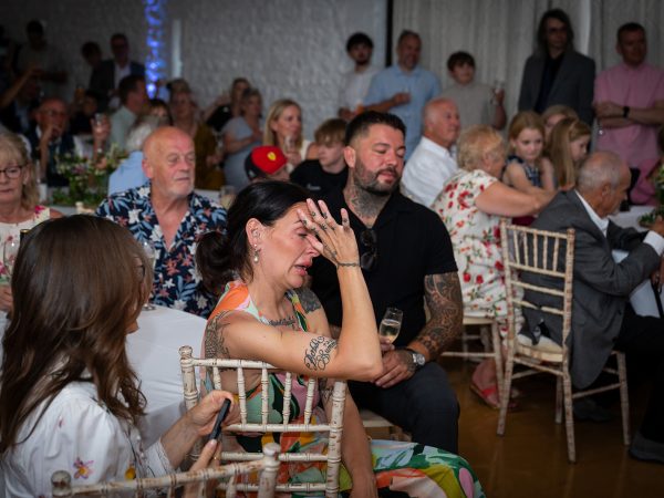 Holly and Andy’s wedding at Field Place – guests enjoying the speeches