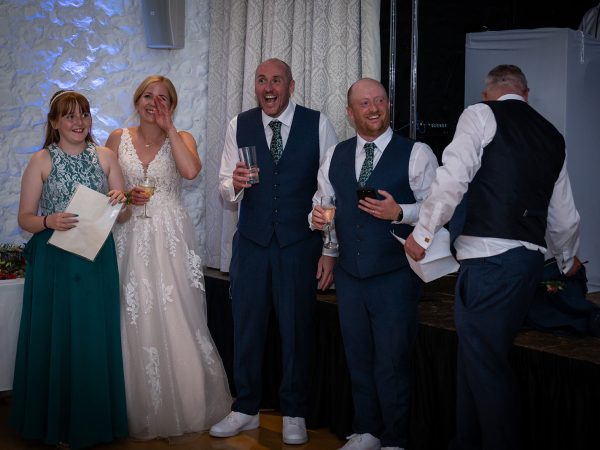 Holly and Andy’s wedding at Field Place – bride and groom during the speeches