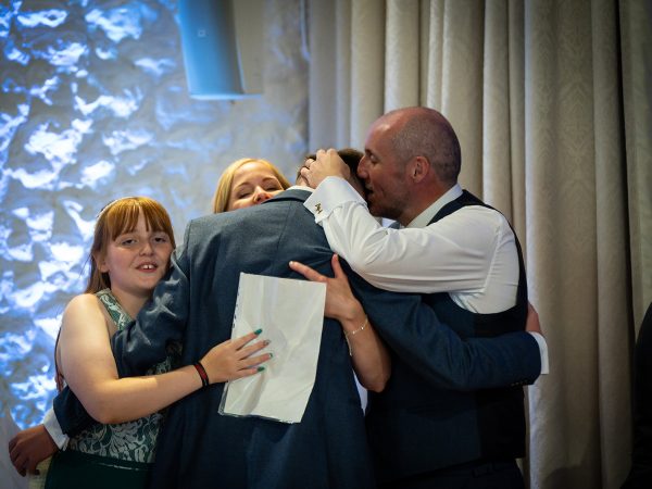 Holly and Andy’s wedding at Field Place – a hug during the speeches